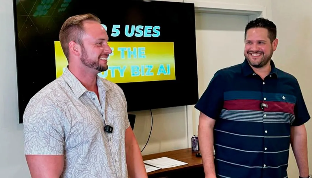 Jake Randolph and Tony Cruz presenting in front of a screen that reads Top 5 uses of Beauty Biz AI